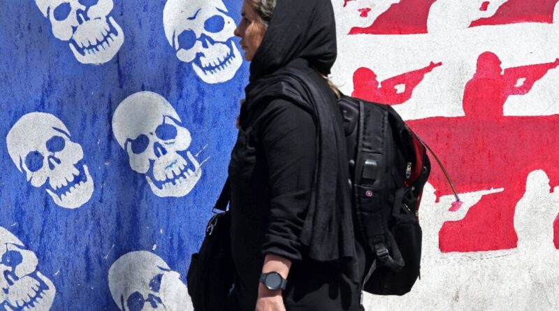 Iran murals project defiance in war with US