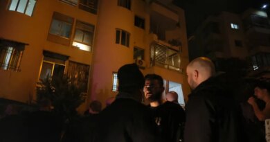 People gather at the site of an Israeli strike that targeted an apartment in the town of Ain Saadeh east of Beirut on April 5, 2026.