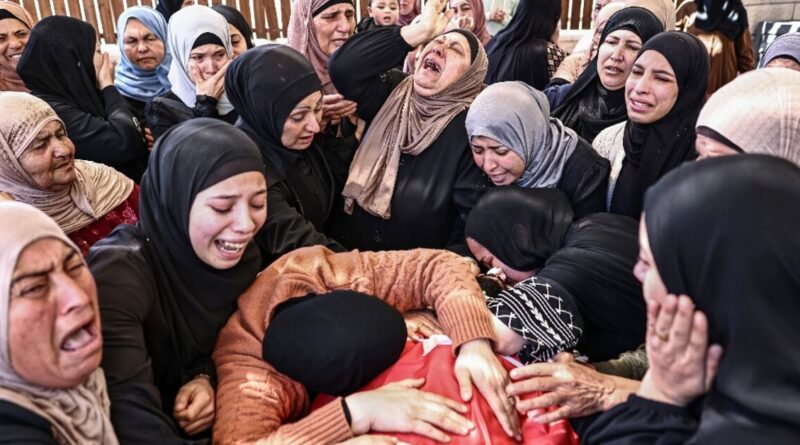 Israeli settlers killed Palestinian teen in raid on school, mourners say