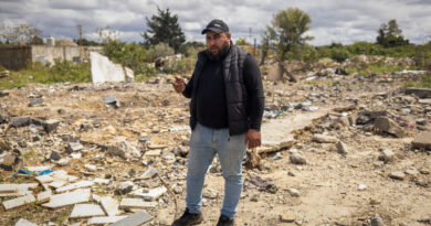 Lebanese man scours home bombed by Israel for mementos of his slain family