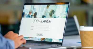 Close up of a Businessman looking at a job search recruitment web page.