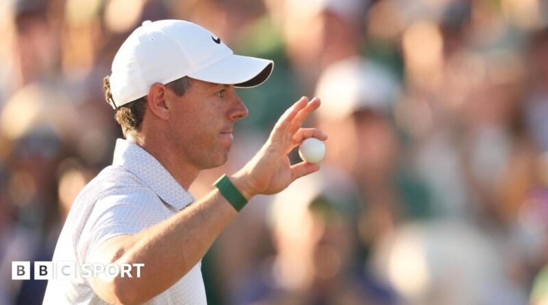 Rory McIlroy waves to the Masters crowd