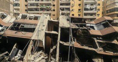 A collapsed building at the site of an overnight Israeli airstrike in the Haret Hreik neighbourhood of Beirut’s southern suburbs on Friday