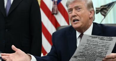 Donald Trump speaks to the press after signing an executive order in the Oval Office.