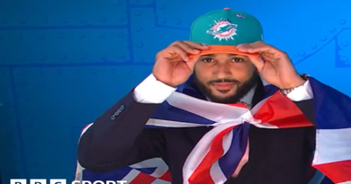 Uar Bernard, seen wearing a cropped black support vest over his upper chest