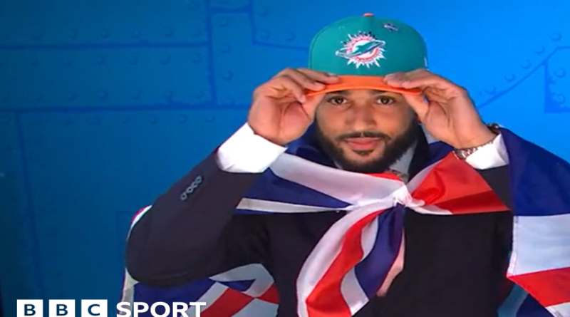 Uar Bernard, seen wearing a cropped black support vest over his upper chest