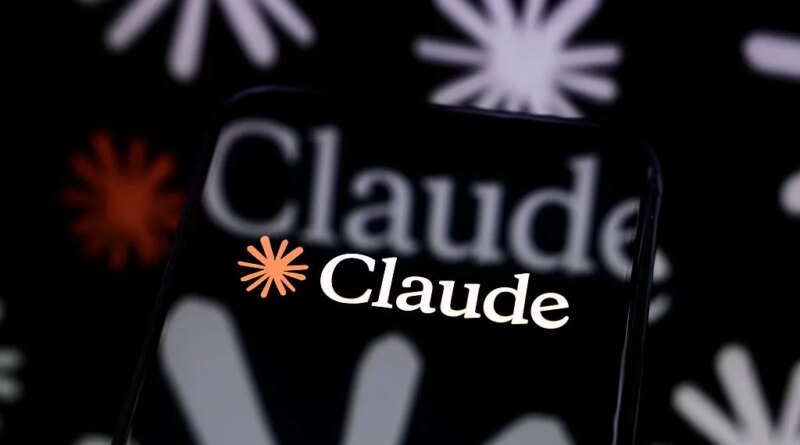 The Claude logo is displayed on a smartphone screen placed on a reflective surface onto which a multitude of Claude logos are projected.