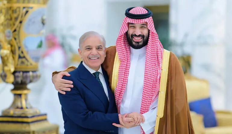 This handout photograph taken and released by Pakistan's Prime Minister Office on April 15, 2026 shows Saudi Arabia's Crown Prince Mohammed bin Salman (R) greeting Pakistan's Prime Minister Shehbaz Sharif prior to their meeting in Jeddah.