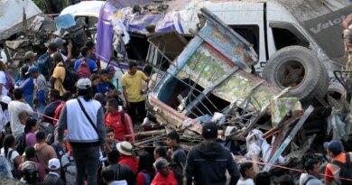 Photos: Bomb attack on Colombia highway kills 19 ahead of election