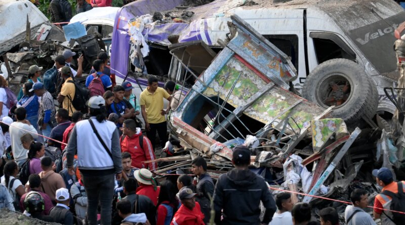 Photos: Bomb attack on Colombia highway kills 19 ahead of election