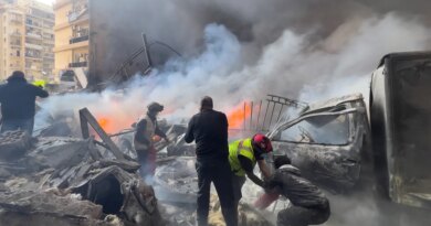 Photos: Israel strikes central Beirut without warning