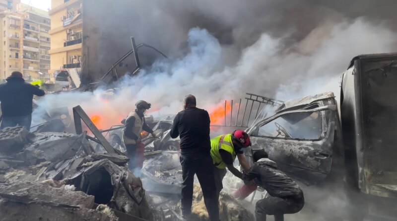 Photos: Israel strikes central Beirut without warning