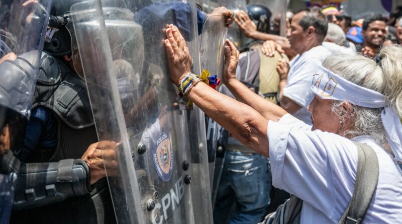 Police in Venezuela block protesters calling for higher wages, pensions