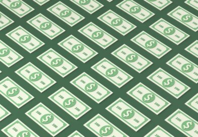 An illustration of patterned 100 dollar bills on a green background
