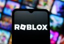 In this photo illustration, the Roblox Corporation logo is seen displayed on a smartphone screen.