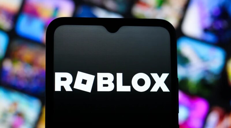 In this photo illustration, the Roblox Corporation logo is seen displayed on a smartphone screen.