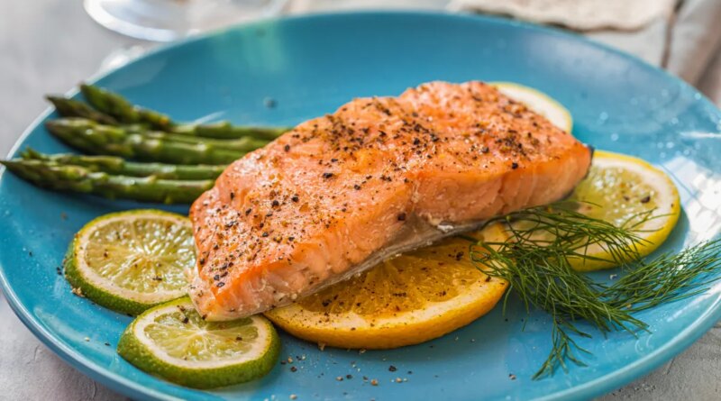 Grilled fillet of salmon with asparagus and a glass of white wine