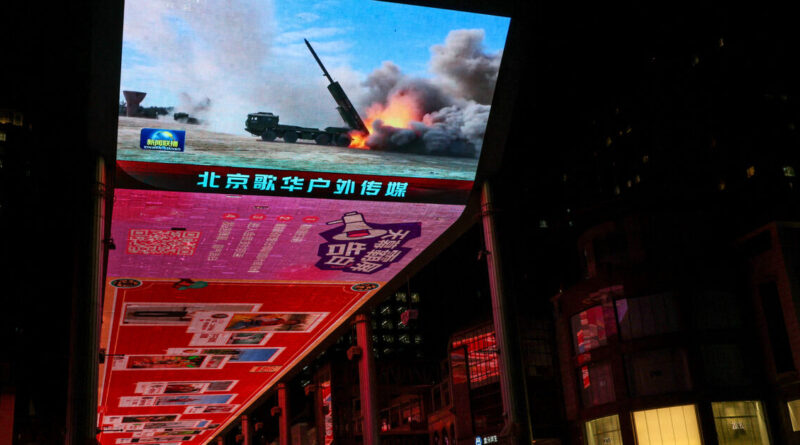 Taiwan sees only warships and warplanes as China talks peace with opposition