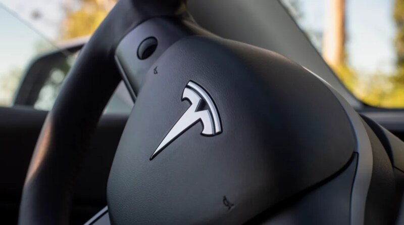 Tesla logo on steering wheel