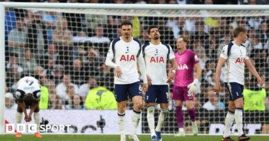 Tottenham's players react after conceding a late equaliser against Brighton