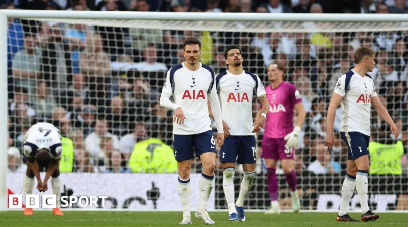 Tottenham's players react after conceding a late equaliser against Brighton