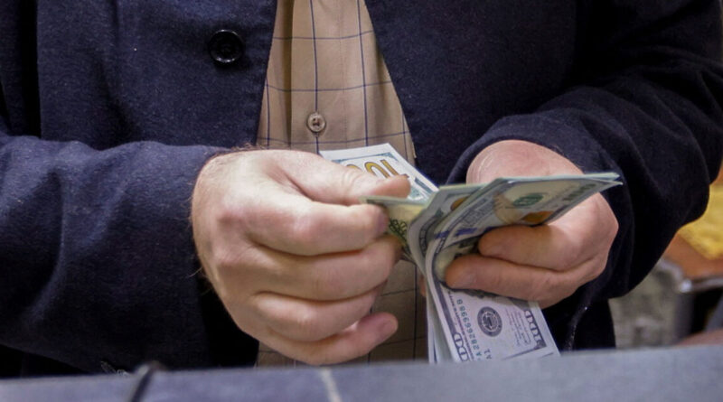 US halts Iraq dollar cash shipment after militia strikes, sources say