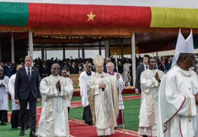 Pope Leo with several people in a procession.