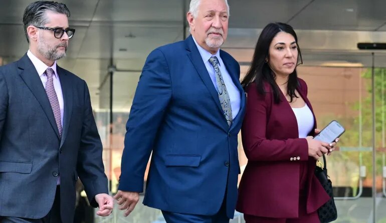 Mark Geragos and Alexandra Kazarian, attorneys for Jasveen Sangha, walk outside the First Street Courthouse in Los Angeles on April 8, 2026.