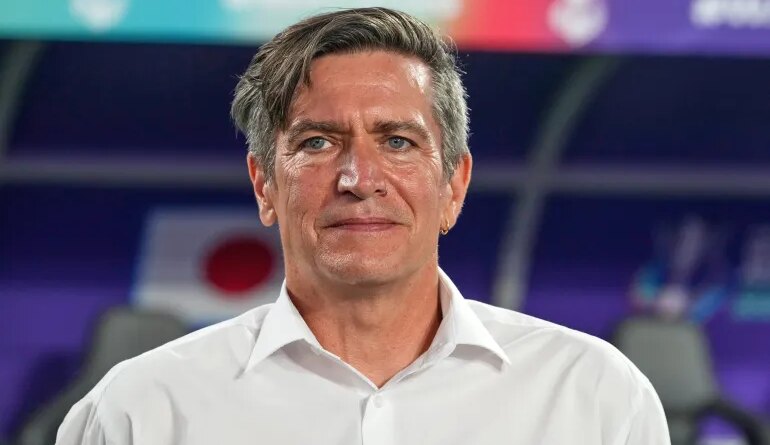 Japan's coach Nils Nielsen stands on the touchline before the Women's Asian Cup soccer final between Japan and Australia