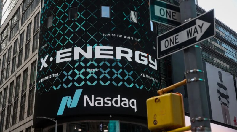 X-energy appears on a sign above the Nasdaq.
