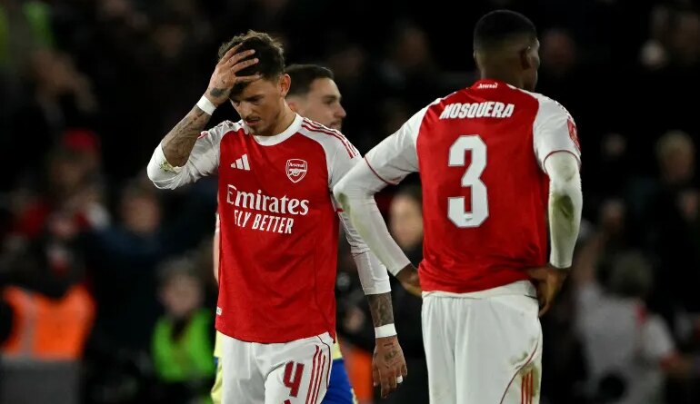 Arsenal's English defender #04 Ben White reacts after the English FA Cup quarter final football match between Southampton and Arsenal at St Mary's Stadium in Southampton, southern England on April 4, 2026. The match finished Southampton 2 Arsenal 1 (Photo by Glyn KIRK / AFP) / RESTRICTED TO EDITORIAL USE. No use with unauthorized audio, video, data, fixture lists, club/league logos or 'live' services. Online in-match use limited to 120 images. An additional 40 images may be used in extra time. No video emulation. Social media in-match use limited to 120 images. An additional 40 images may be used in extra time. No use in betting publications, games or single club/league/player publications. /