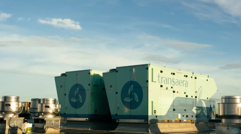 Two DOAS units stand on a rooftop.