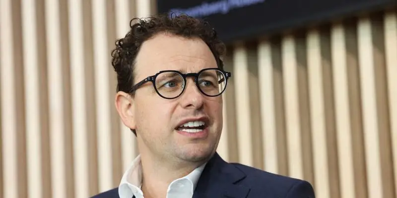 Anthropic CEO Dario Amodei jokes that his company's extreme revenue growth is 'too hard to handle.'
