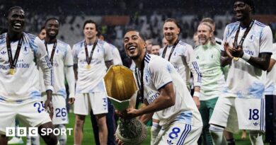 Youri Tielemans of Aston Villa FC lifts the trophy during the award ceremony following the UEFA Europa League final