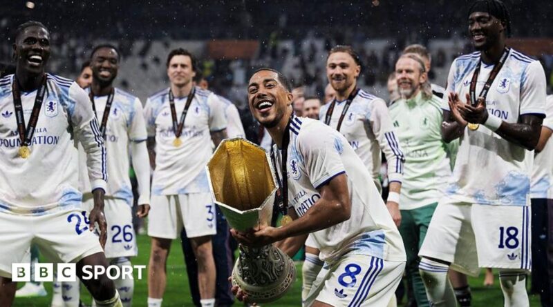Youri Tielemans of Aston Villa FC lifts the trophy during the award ceremony following the UEFA Europa League final