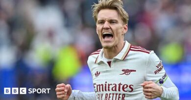 Martin Odegaard celebrates Arsenal's win.