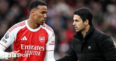 Arsenal manager Mikel Arteta talks to defender Gabriel