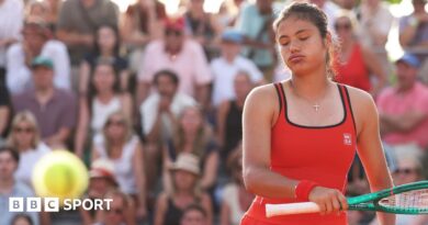 Emma Raducanu sighs as she watches the ball go past her for a winner at the 2026 French Open