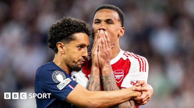Paris St-Germain captain Marquinhos hugs his Brazilian team-mate Gabriel after the Arsenal defender missed a decisive penalty in their Champions League final shootout.