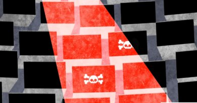 an illustration of a red light cast down on a bunch of computers