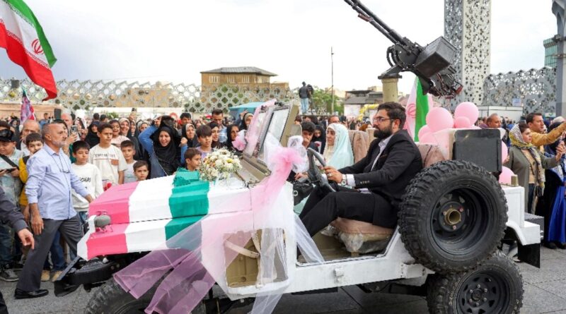 Iran stages mass weddings for couples ready for war 'sacrifice'
