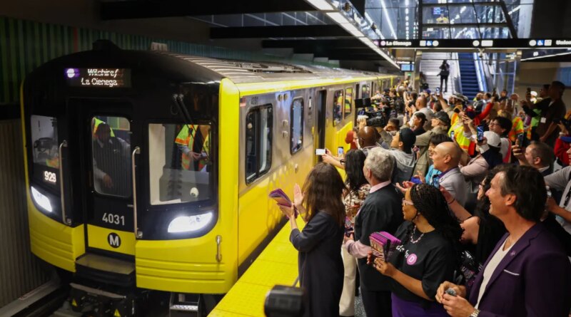 One of the first trains open to the public arrives to the Wilshire/Fairfax station during the opening of the Metro D Line subway extension in Los Angeles on May 8, 2026.