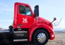 Cab of red Peterbilt semi truck