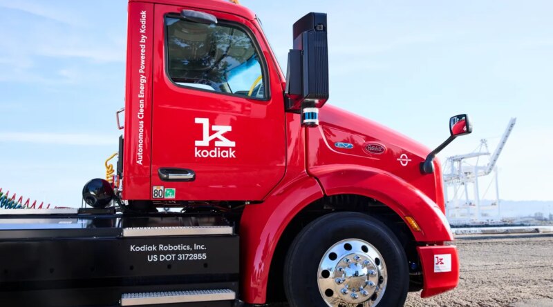 Cab of red Peterbilt semi truck