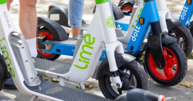 A row of e-scooters