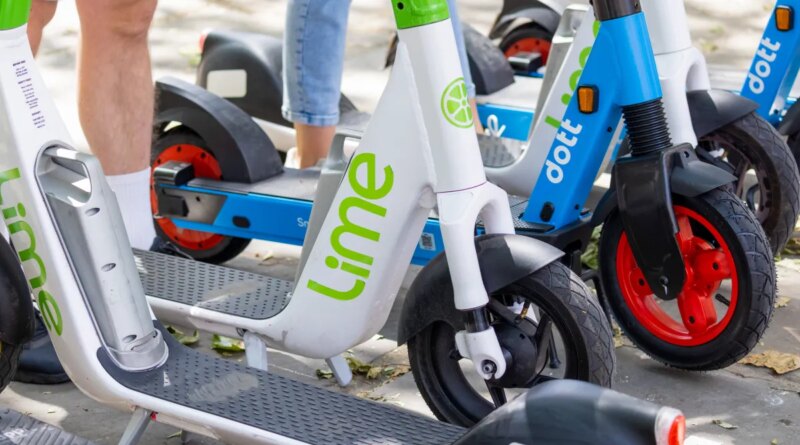 A row of e-scooters