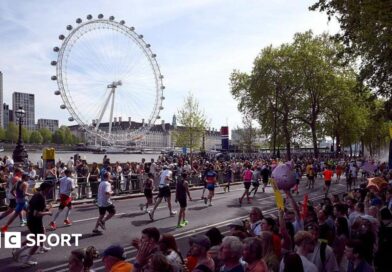London Marathon runners with the London Eye in the background