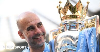 Pep Guardiola holds up six fingers to fans to indicate the six Premier League titles won after their match with Liverpool in December 2024 