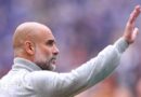 Pep Guardiola waving