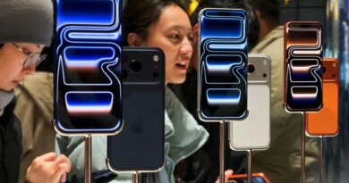 Customers try out iPhone 17 Pro smartphones inside the Apple Store at Sanlitun Taikoo Li on November 8, 2025, in Beijing, China.